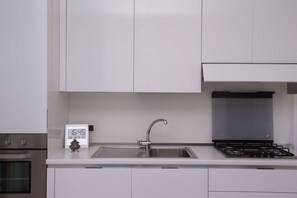 Fridge, oven, dining tables