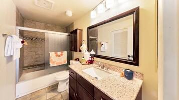 Tina con regadera y secadora de cabello