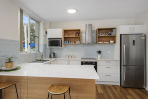 Fridge, microwave, oven, stovetop - Cute Beachside Apartment - Central Location (Crescent Head)