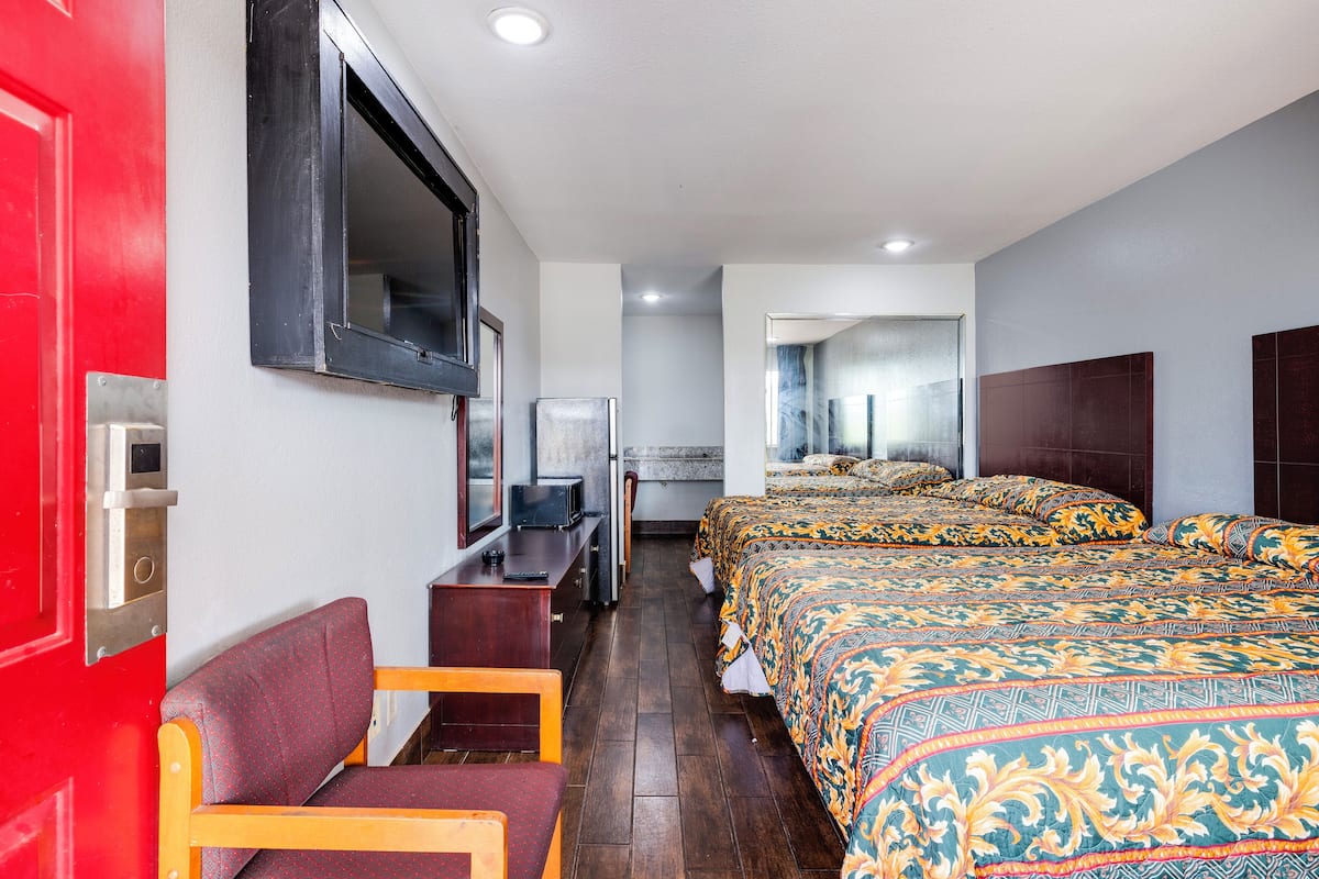 Room, 2 Queen Beds, Non Smoking | Desk, WiFi (free), bed sheets