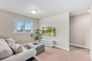 House, Multiple Beds (Spacious Home near River with King Be) | Living room | 50-inch flat-screen TV with digital channels, TV