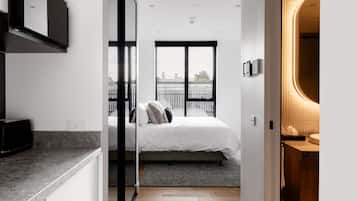 2 bedrooms, pillowtop beds, soundproofing, iron/ironing board