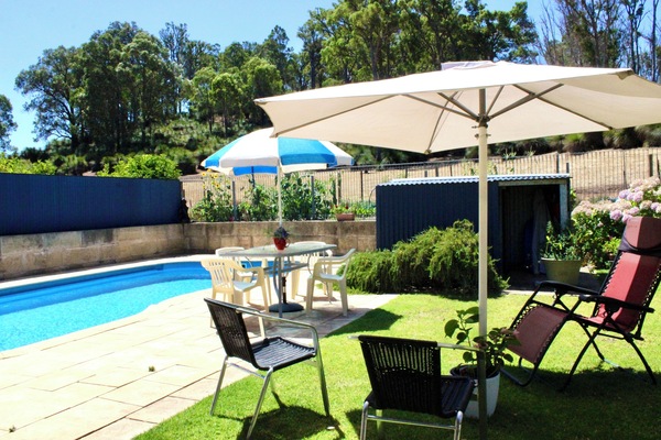Salt water swimming pool for guests use looking out to the stunning grass trees.