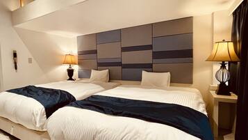 Kahden hengen executive-huone (kaksi sänkyä), tupakointi kielletty (B) | Työpöytä, silitysrauta/-lauta, ilmainen Wi-Fi, vuodevaatteet