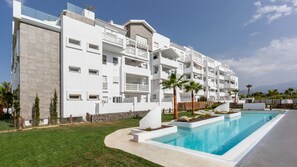 A modern hotel with a pool, white exterior, and balconies. - Ref. 336891 (Motril)