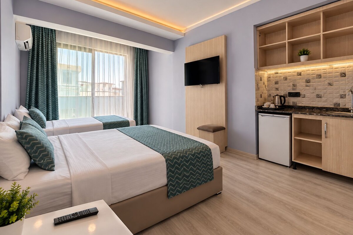 Family Room | Minibar, in-room safe, soundproofing, WiFi (free)