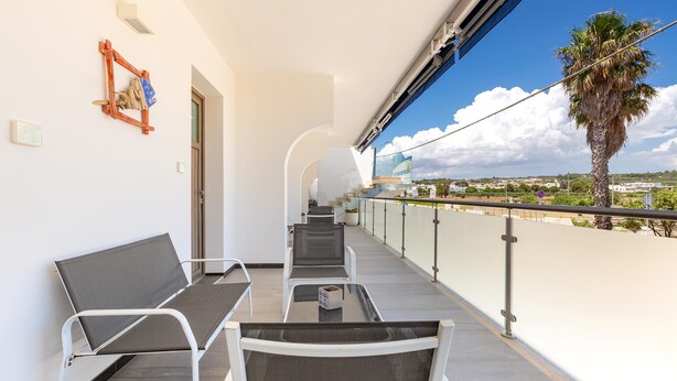 A balcony with seating and a view of the landscape. - 2132 Maresidence - Camere Triple (Salve)