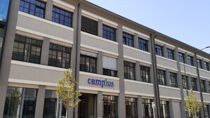 A modern building with the sign 'campplus' on the facade. - Camplus Regio Parco (Turin)