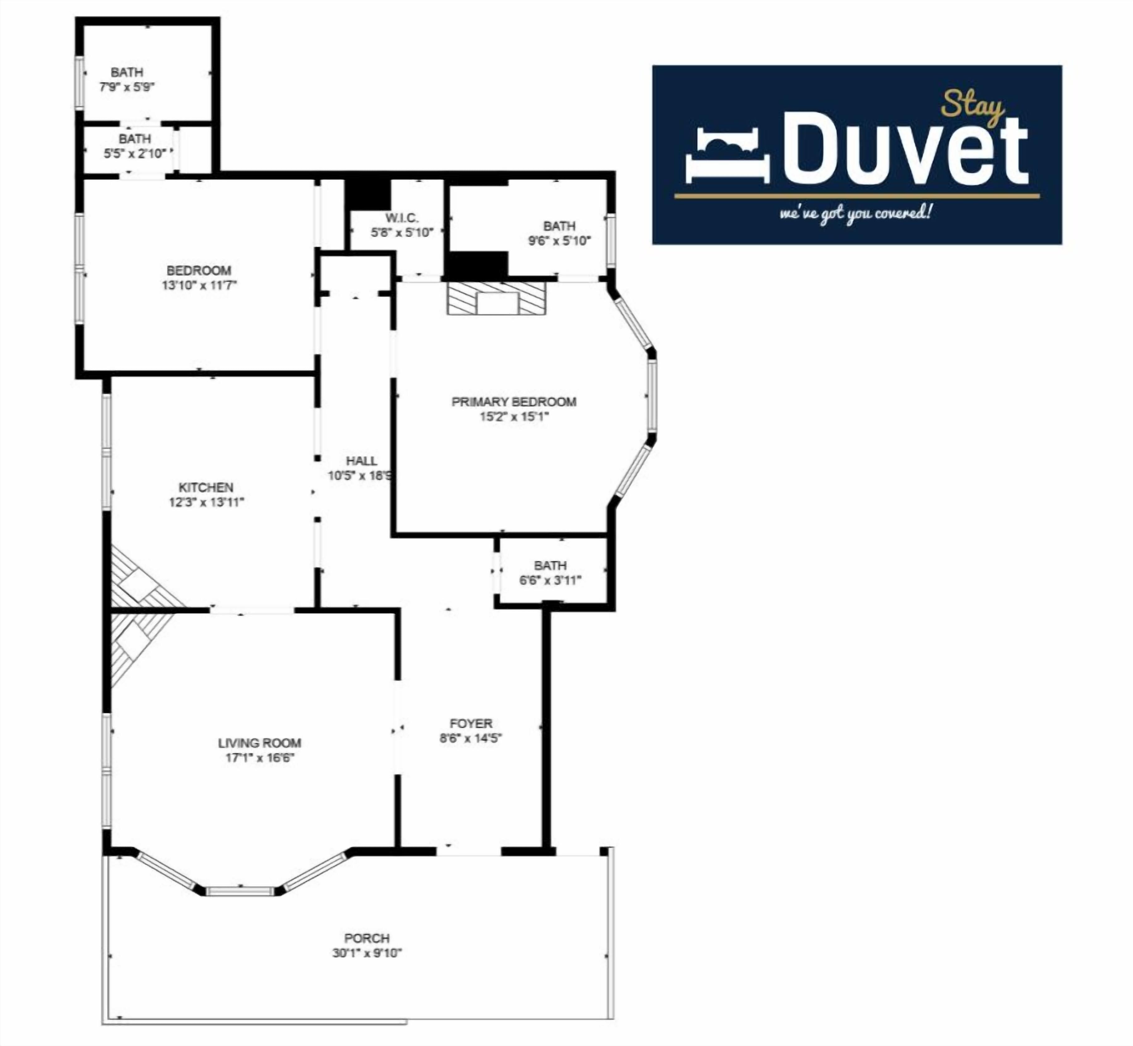 A floor plan of a hotel room with a living room, kitchen, two bathrooms, a foyer, a primary bedroom, and a porch.