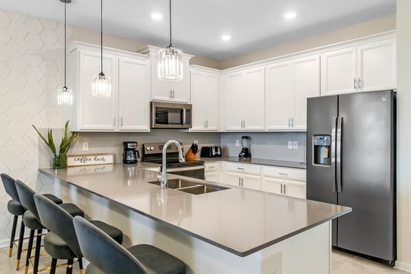 Fridge, microwave, oven, stovetop