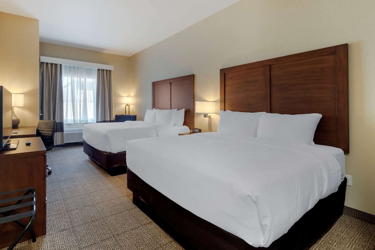 pillow-top beds, desk, blackout curtains, iron/ironing board