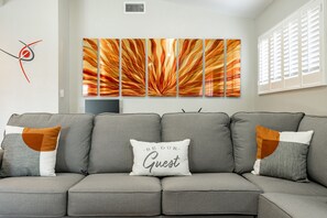 Smart TV, fireplace, books, stereo