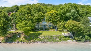 Exterior - Lakefront Torch Lake Home - Cottage Feel w/ 5 BR and Over 4K Sq Ft, Private Dock (Kewadin)