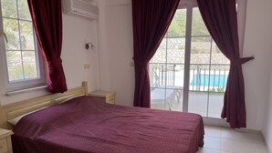 Apartment, Multiple Beds | 2 bedrooms, iron/ironing board, travel crib, WiFi (free) - Stunning Spacious Poolside 2-bed Apt in Ovaçik (Fethiye)