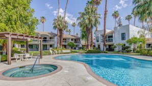 A pool area with a hot tub, lounge chairs, and a pergola. - South Palm Springs Resort-Style Getaway (Palm Springs)