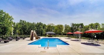 Outdoor Pool with Slide and Gazebo.