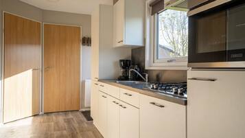 Microwave, dishwasher, highchair, dining tables