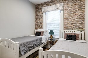 2 bedrooms, desk, iron/ironing board, travel crib