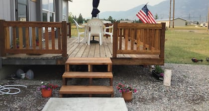 Bright and cheerful. With glorious sunrise/sunset views, close to Glacier park.