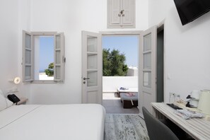 Deluxe Double Room with Balcony | Premium bedding, memory foam beds, minibar, in-room safe - The Museum Project Oia (Santorini)