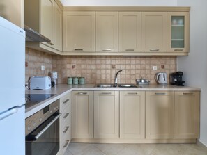 Fridge, microwave, oven, coffee/tea maker