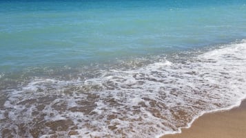 Private beach, sun-loungers, beach towels, beach volleyball