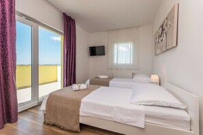4 chambres, fer et planche à repasser, accès au Wi-Fi (inclus)