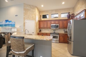 Fridge, microwave, oven, stovetop - Naples newly furnished pool home with lake view (Naples)