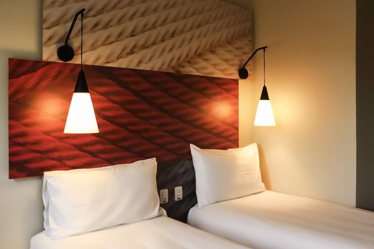 Standard Room, 2 Twin Beds | Minibar, individually decorated, individually furnished, desk