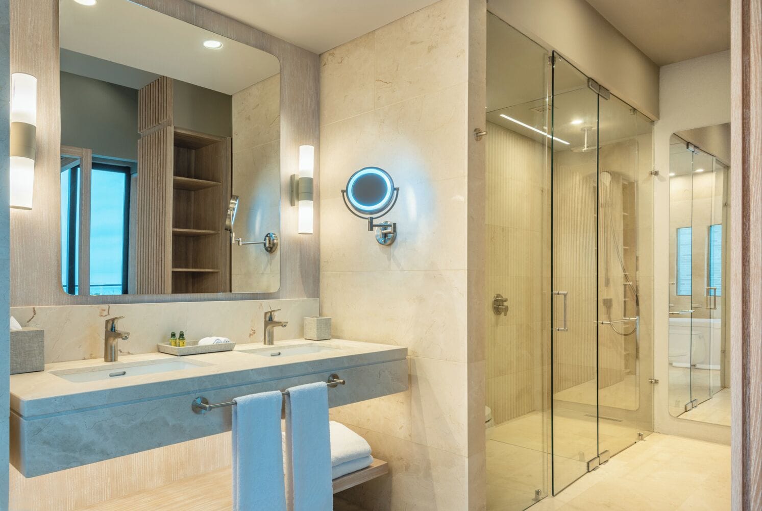 designer toiletries, hair dryer, bathrobes, slippers