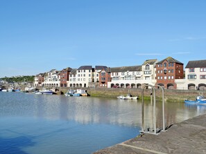 A waterfront with buildings and boats. - 4 bedroom accommodation in Maryport (Maryport)