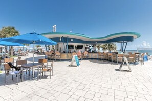 Outdoor dining - Family-Friendly 2BR Dlx at Ocean Walk—Beach Access, Pools & Lazy River Included! (Daytona Beach)