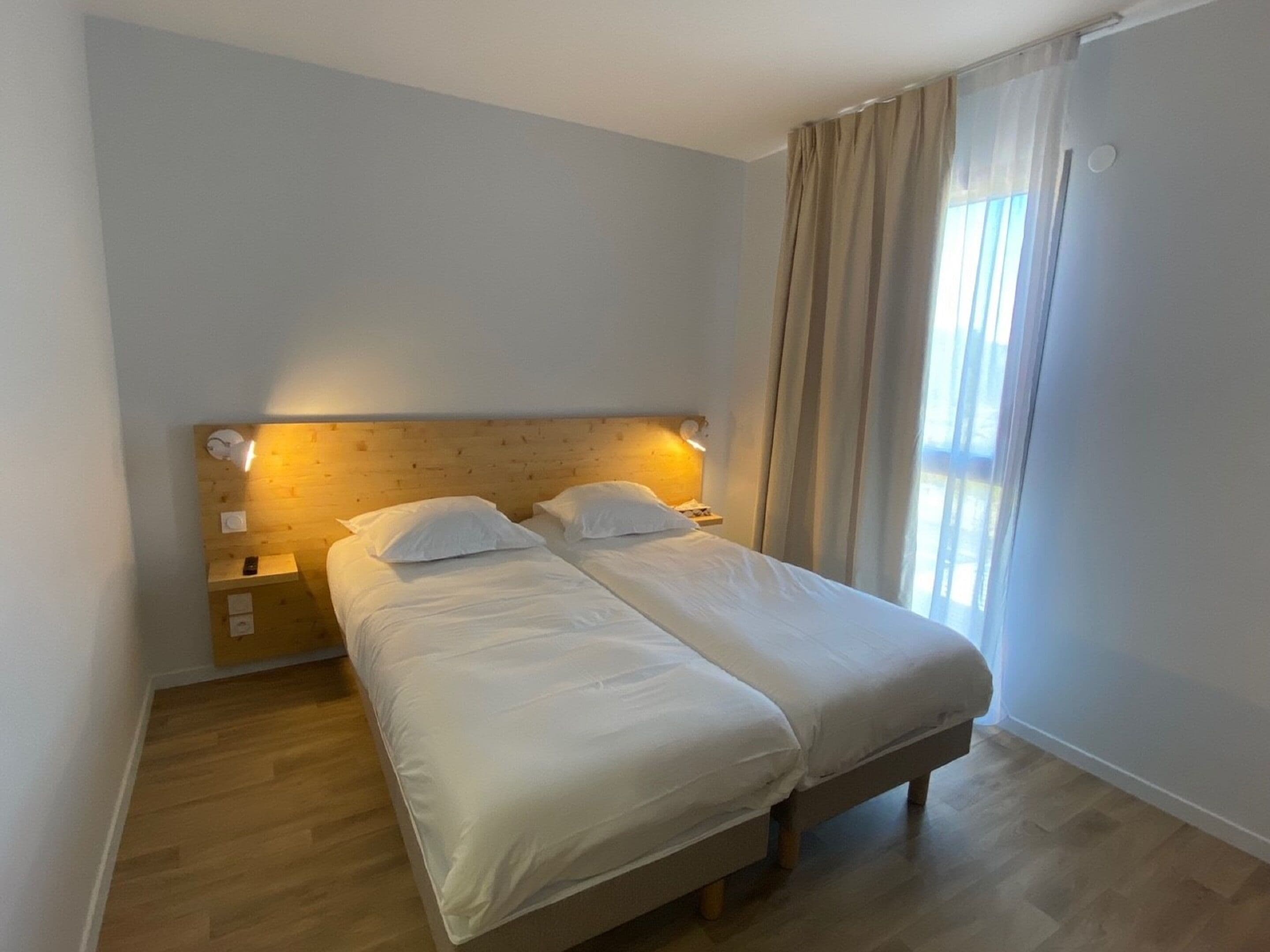 standard twin room | premium bedding, desk, laptop workspace, soundproofing