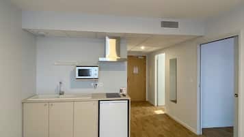 Premium bedding, desk, laptop workspace, soundproofing