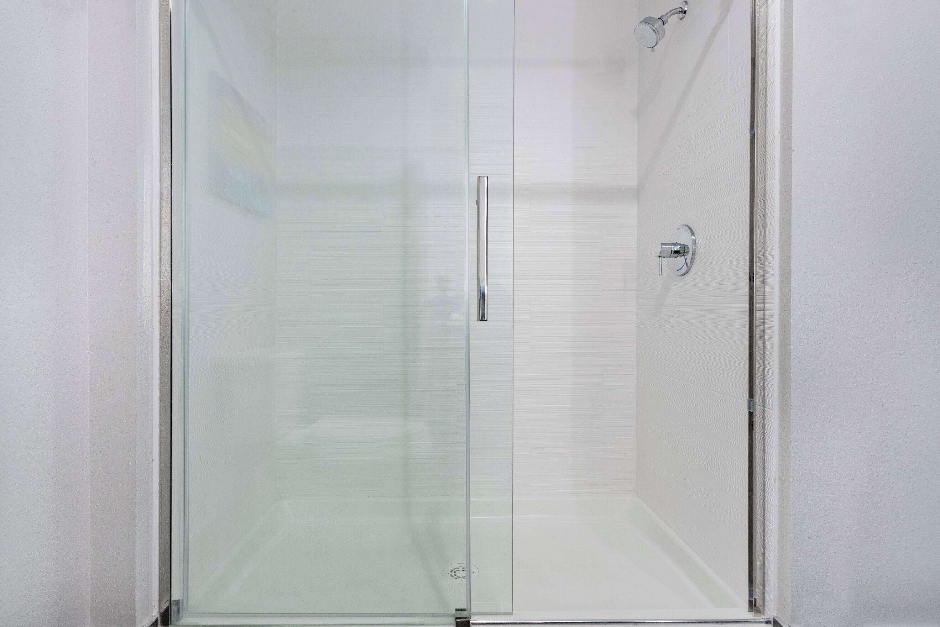 hydromassage showerhead, free toiletries, hair dryer, towels