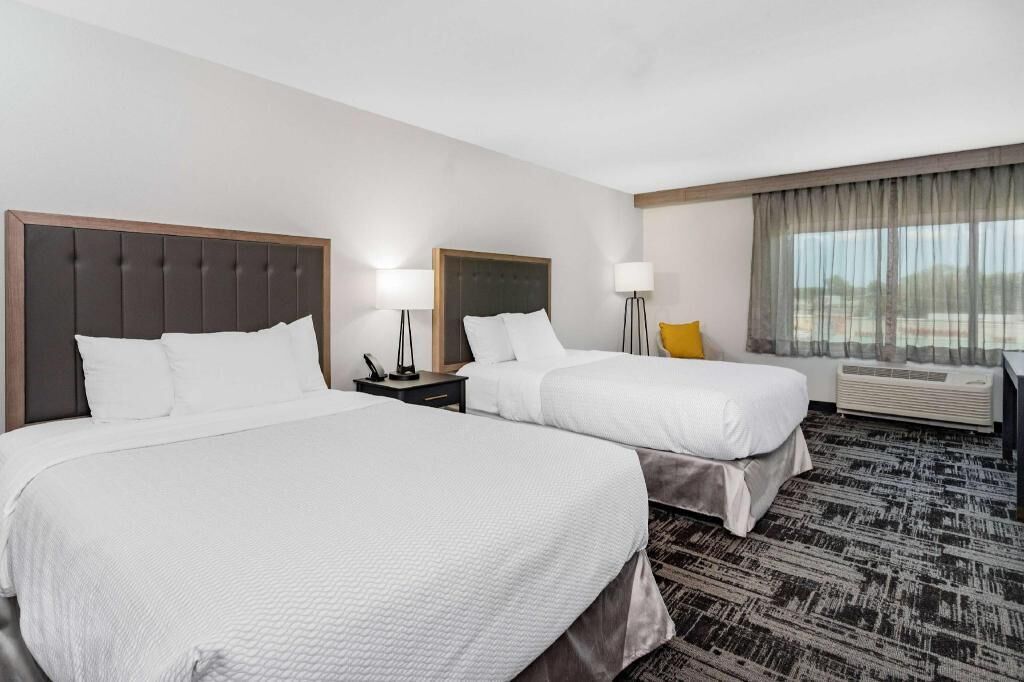 Pillow-top beds, desk, laptop workspace, blackout curtains