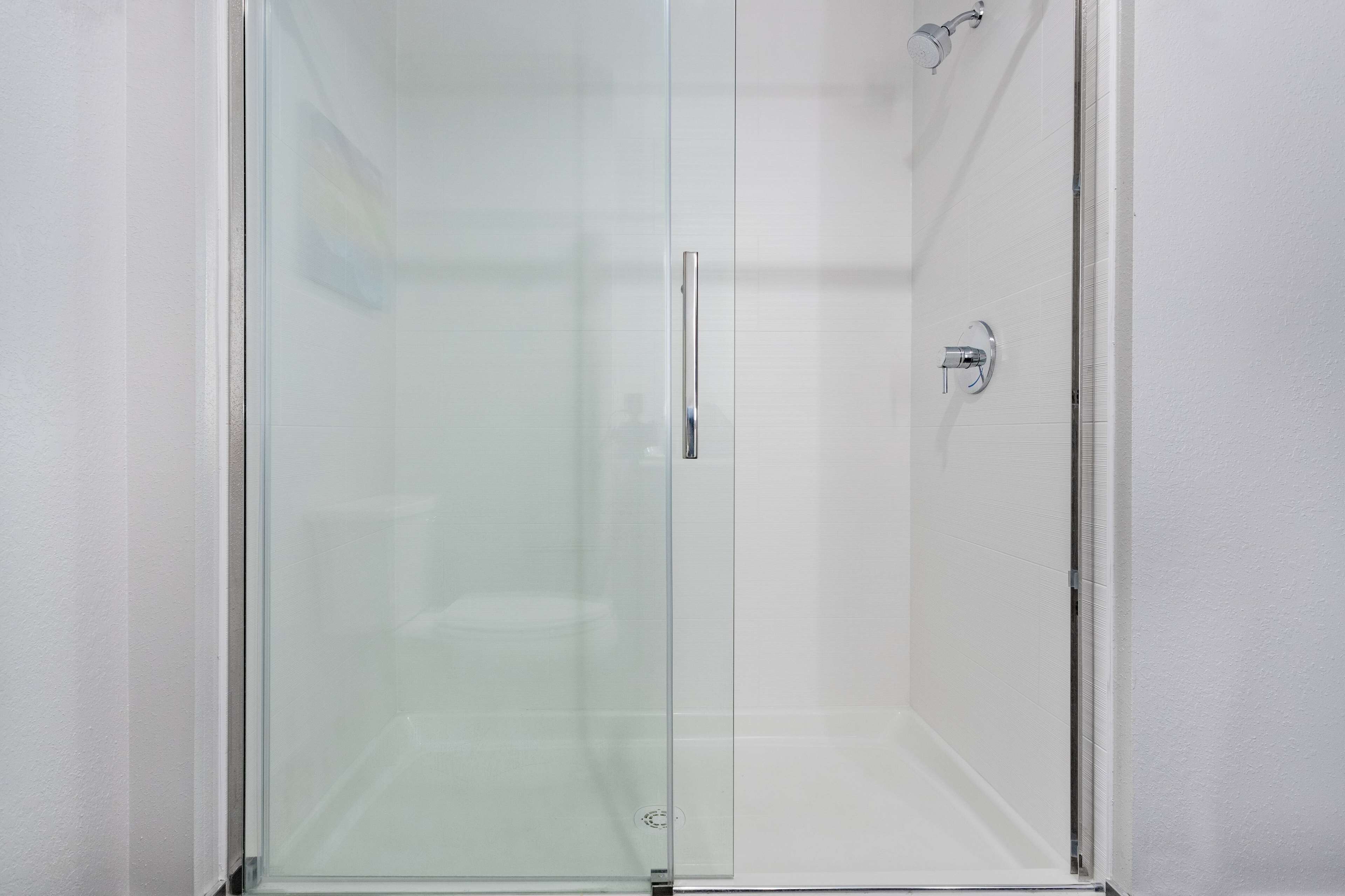 hydromassage showerhead, free toiletries, hair dryer, towels