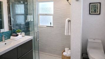 Hair dryer, towels, soap, shampoo