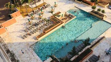 Outdoor pool, pool umbrellas, sun loungers
