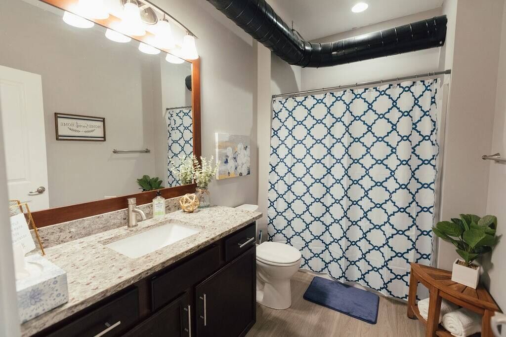 Bathtub, hair dryer, towels