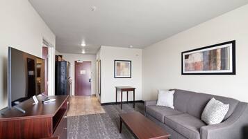 Suite, 1 King Bed with Sofa bed, Non Smoking (Extended Stay) | Living area | 40-inch flat-screen TV with satellite channels, TV