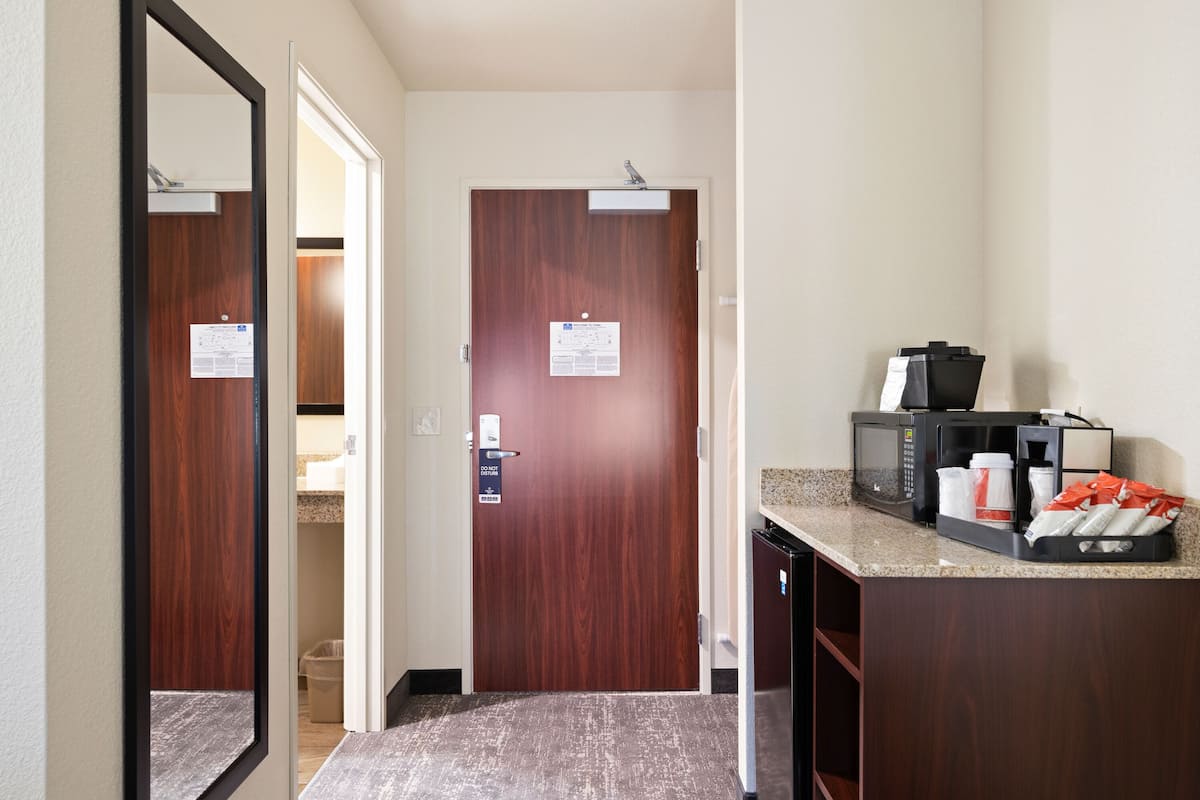 down duvets, pillow-top beds, in-room safe, desk