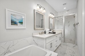 Combined shower/tub, eco-friendly toiletries, hair dryer, towels