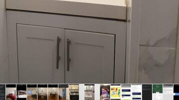 Combined shower/tub, hair dryer, soap, toilet paper