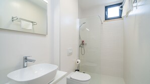 A modern bathroom with a large white sink, a toilet, and a glass-enclosed shower. - Apartments Zoom Zoom-Studio Apartment with Balcony (Grey) (Dubrovnik)