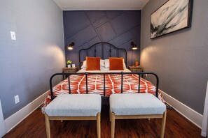 1 bedroom, desk, iron/ironing board, travel crib