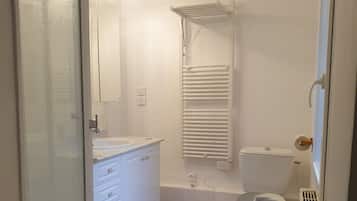 Shower, hair dryer, soap, shampoo