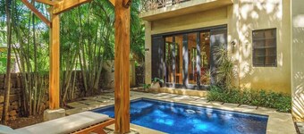 Charming condo has its own pool and is only steps away from the beach and Langosta Beach Club