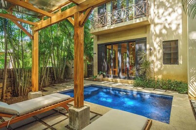 Charming condo has its own pool and is only steps away from the beach and Langosta Beach Club