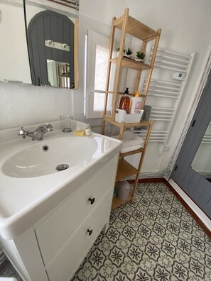 Shower, hair dryer, soap, shampoo
